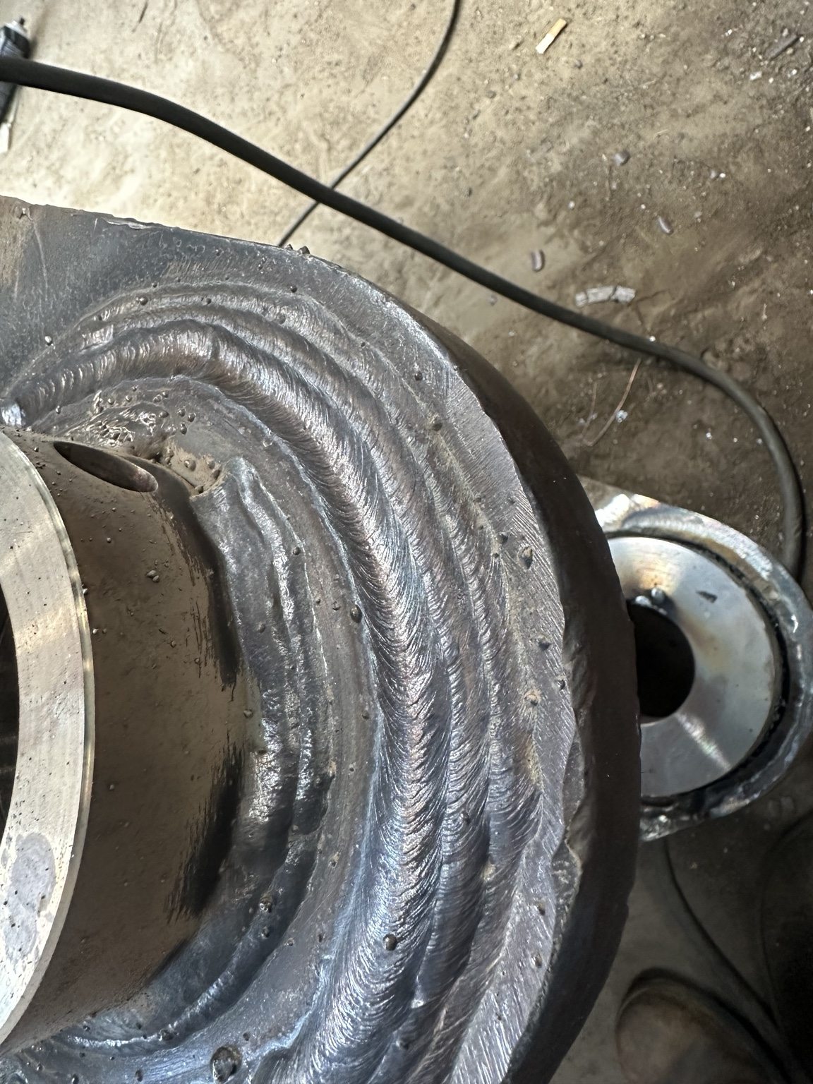 Heavy-duty weld buildup on worn steel components